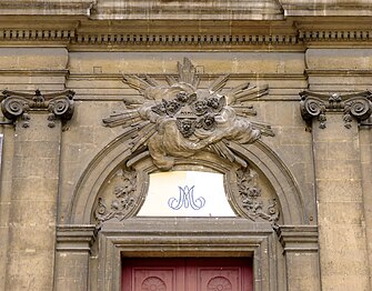 Detail of the portal, depicting a flight of angels