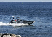 A passenger USV demonstration at Hampton, Virginia, United States (January 2009) US Navy 090114-N-4515N-151 The Navy, in conjunction with the Spatial Integrated Systems Incorporated, holds a demonstration of a fully autonomous unmanned surface vehicle.jpg
