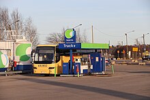 Neste's petrol station for trucks and buses in Helsinki, Finland. Vainio bus refuelling at Neste Truck station in Hermanninranta, Helsinki, Finland, 2021 April.jpg