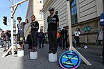 XR-aktivister i symboliska galgar. München i Tyskland den 20 september 2019