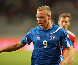 Колбейн у форме зборнай Ісландыі у матчы супраць Аўстрыі 30 мая 2014 года