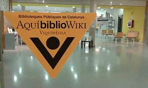 Bibliowiki stickers at the entry door of a library