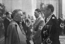 Cesare Orsenigo (left, with Hitler and Ribbentrop), nuncio to Germany, also served as de facto nuncio to Poland. Bundesarchiv Bild 183-H26878, Berlin, Neujahrsempfang in der neuen Reichskanzlei.jpg
