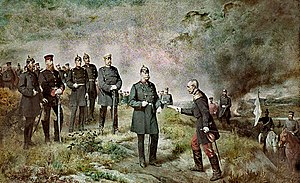 After the Battle of Sedan 1870 (General Reille hands King Wilhelm a letter by Emperor Napoleon III) by Carl Steffeck (1884) - The Prussian minister president and later German chancellor Otto von Bismarck (behind the king) with Generals Roon and Moltke (left of Bismarck). Despite Bismarck being a civilian politician, he wore a military uniform as part of militaristic Prussian culture. Carl Steffeck-Reille1884,Ruhmeshalle-1.JPG