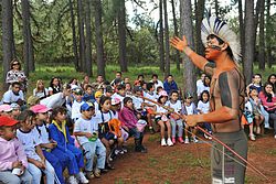 Fulni-o representative talks about the culture of his people to schoolchildren in the Botanical Garden of Brasilia, in celebration of Indian Day, 2011 Fulni-o fala da cultura do seu povo.jpg