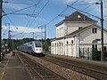 Station met passerende TGV Duplex