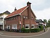 helft van een dubbel woonhuis, Late Amsterdamse School