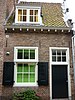 Eenvoudige woning. Zijkant topgevel