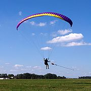 Paraglider towed launch, Mirosławice, Poland.