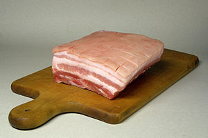 Uncooked pork belly, with rind (skin)