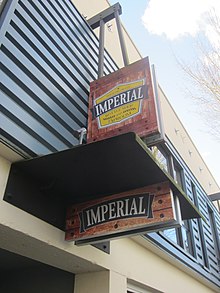 Photograph of a sign on a building's exterior