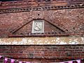 The Old King's Head. Mannerist brick decoration over earlier doorway