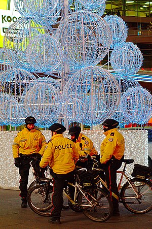 Toronto bicycle police officers in Yonge Dunda...