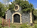 A well house above the Mourne Conduit near Ballynahinch and red access gate, now both listed.[15]