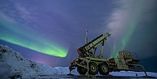An MIM-104 Patriot missile battery in Alaska operated by the 11th Air Defense Artillery Brigade 220305-F-EI268-1044 - Arctic sky illuminates Patriot (Image 2 of 2).jpg