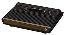 From 1980, the VCS has only four front switches and a capital-letters logotype. Atari-2600-Woody-FL.jpg