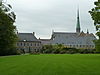 Ensemble gevormd door de gebouwen van de oude abdij van Godsdal en het omliggende land te Charneux