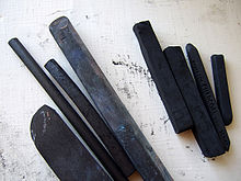 Four sticks of vine charcoal and four sticks of compressed charcoal Charcoal sticks 051907.jpg
