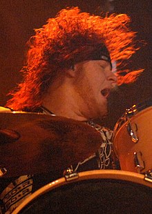 Hanson performing in 2009