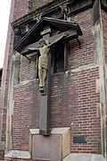 Crucifix outside base of tower of St Agatha, Sparkbrook
