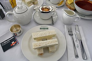 Cucumber and cream cheese sandwiches with tea ...