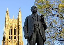 Statue of James B. Duke in foreground with Duke Chapel behind