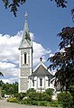 Katholische Kirche Mariä Namen und Pfarrhaus mit Garten und Einfriedung