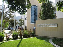 The exterior of the Los Angeles Police Department's West Valley Area Police Station. The LAPD operates approximately 21 such stations divided across Los Angeles; this one covers policing in the San Fernando Valley. LAPD West Valley Police Station Front.jpg
