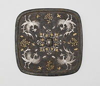 Mirror with floral medallion, plant sprays, birds, and insects, 8th century