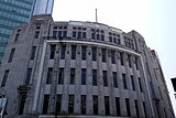 The central feature of the Oriental Building consisting of perpendicular piers running up three storeys.