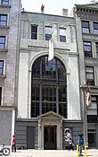 204 Fifth Avenue (1913), designed by C. P. H. Gilbert, with a "Gormley" statue on top