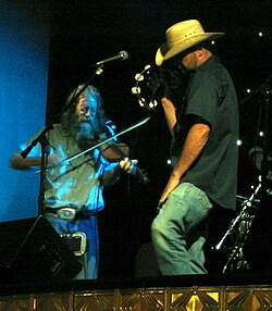 Crouch performing with John Cooper of the Red Dirt Rangers in 2006
