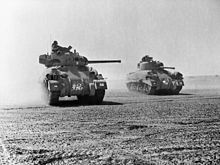 Sherman tanks of 9th Queen's Royal Lancers during the Second Battle of El Alamein, 5 November 1942 Sherman tanks of 9th Queen's Royal Lancers during the Battle of El Alamein, 5 November 1942. E18972.jpg