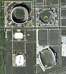 The configuration of the South Philadelphia Sports Complex in early 2004. Clockwise from top right: Citizens Bank Park, Lincoln Financial Field, Wells Fargo Center (formerly the site of John F. Kennedy Stadium), Wachovia Spectrum (razed in 2010-11), and Veterans Stadium (demolished on March 21, 2004). Interstate 95 can be seen running through the bottom right corner of the photo. South Philadelphia Sports Complex.jpg