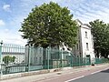 Block built as part of the new west front (1867-71) to house 24 subalterns. In the background part of the east barrack block (1783).[18]