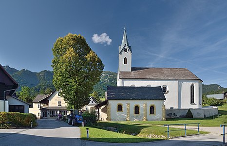 Centre of Weng im Gesäuse (Styria) with the inn Gasthaus zum Kirchenwirt, the parish church and Sebastiani chapel