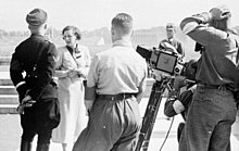 Leni Riefenstahl with Heinrich Himmler at Nuremberg in 1934 Bundesarchiv Bild 152-42-31, Nurnberg, Leni Riefenstahl mit Heinrich Himmler.jpg