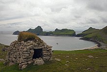 Village Bay, St Kilda, a World Heritage Site, and seabird haven Cleit above Village Bay.jpg