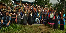 Momolian priests and priestesses together with guardians of the sacred mountain pose at "International Sacred Mountain Guardian Summit Commemorative Accord Stone" in November 2015 NAS 1650 copy 2.jpg