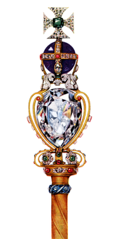 Золотой стержень, увенчанный большим бриллиантом, сам поддерживает большой круглый аметист, на вершине которого находится крест из бриллиантов с изумрудом в центре.
