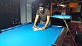 Image 24A player racking the balls (from Pool (cue sports))