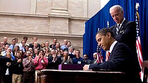 United States President Barack Obama signs int...