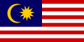 1950年至1963年的马来亚国旗——十一芒星与十一条纹，而今天的马来西亚国旗有十四芒星与十四条纹。