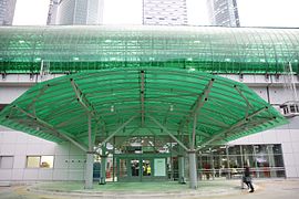 The station has green tinted transparent walls