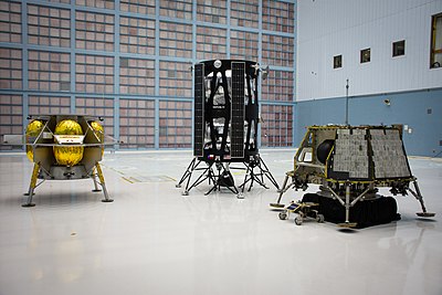 Models of the first three commercial robotic landers selected for CLPS. From left: Peregrine by Astrobotic Technology, Nova-C by Intuitive Machines, and Z-01 by OrbitBeyond. NASA Selects First Commercial Moon Landing Services for Artemis Program (47974872533).jpg