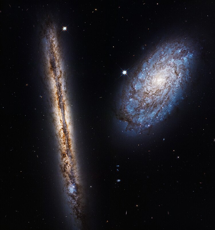27th anniversary image - April 2017 - Interacting galaxies NGC 4302 and NGC 4298 NGC 4298 and NGC 4302 - Heic1709a.jpg