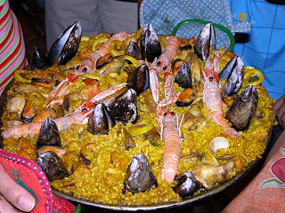 Paella mixte (viande et fruits de mer) →(es) Paella mixta (carne y marisco) →(ca) Paella mixta (carn amb marisc)