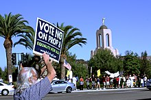 Protesters in front of the Newport Beach California Temple voicing their opposition to the church's support of Prop 8 Prop8templeProtest.jpg