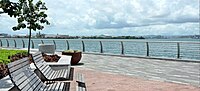 Pedestrian path along the bay, with chairs and footrests