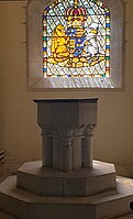 Baptistry: C13 font; stained glass probably c.1830